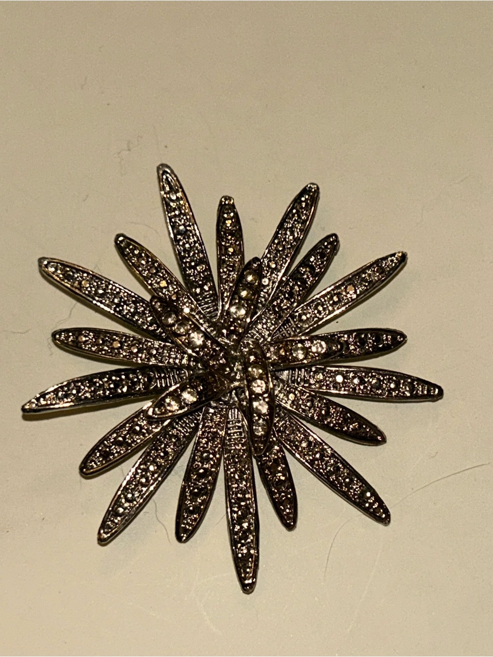 Sparkling Starburst Brooch - Silver Crystal Accent